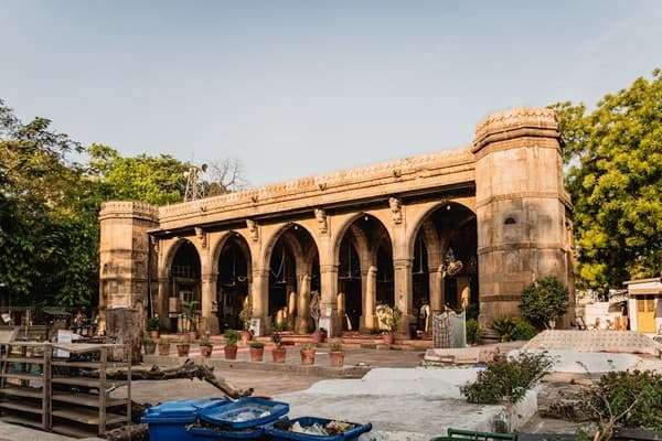 Explore the iconic Sidi Saiyyed Mosque in Ahmedabad, showcasing intricate architecture and historical charm. Explore the iconic Sidi Saiyyed Mosque in Ahmedabad, showcasing intricate architecture and historical charm.